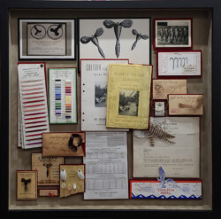 All memorabilia mounted using reversible techniques Shadowbox with memorabilia from a family business